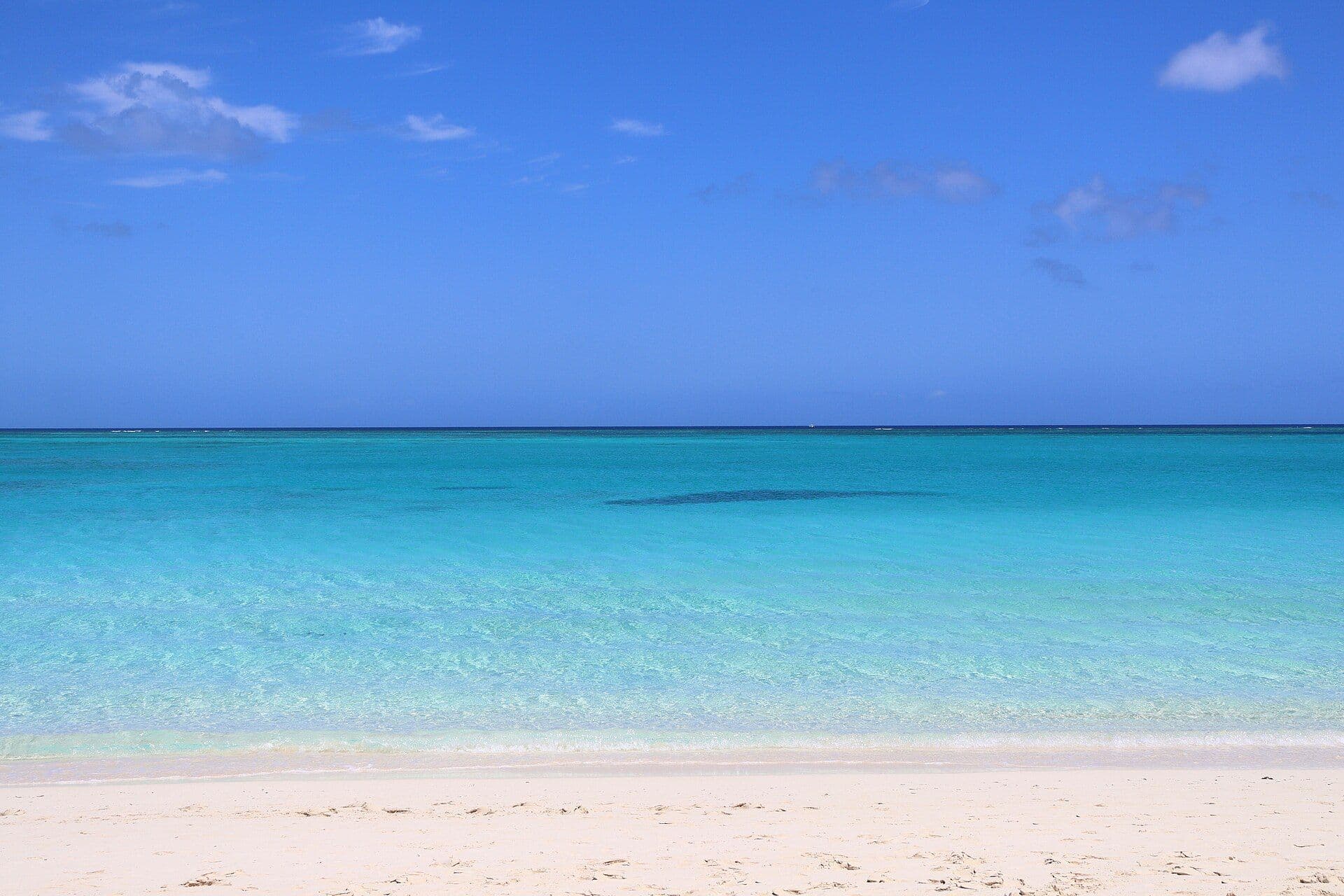 Turquoise water and white sand at Grace Bay